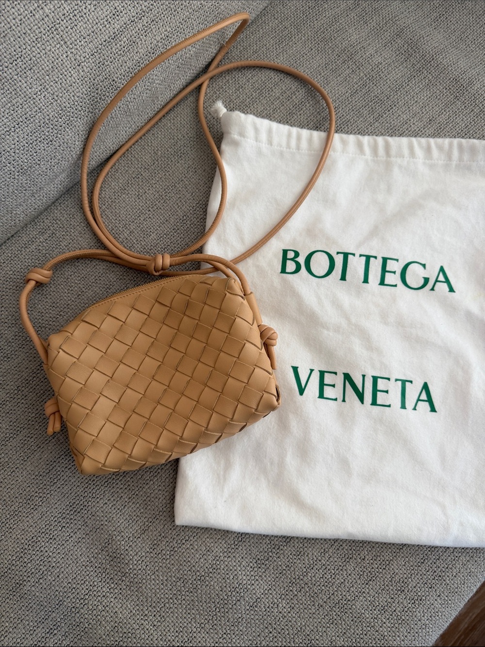 Bottega Veneta Tan Intrecciato Nappa Crossbody Bag
Mini loop .